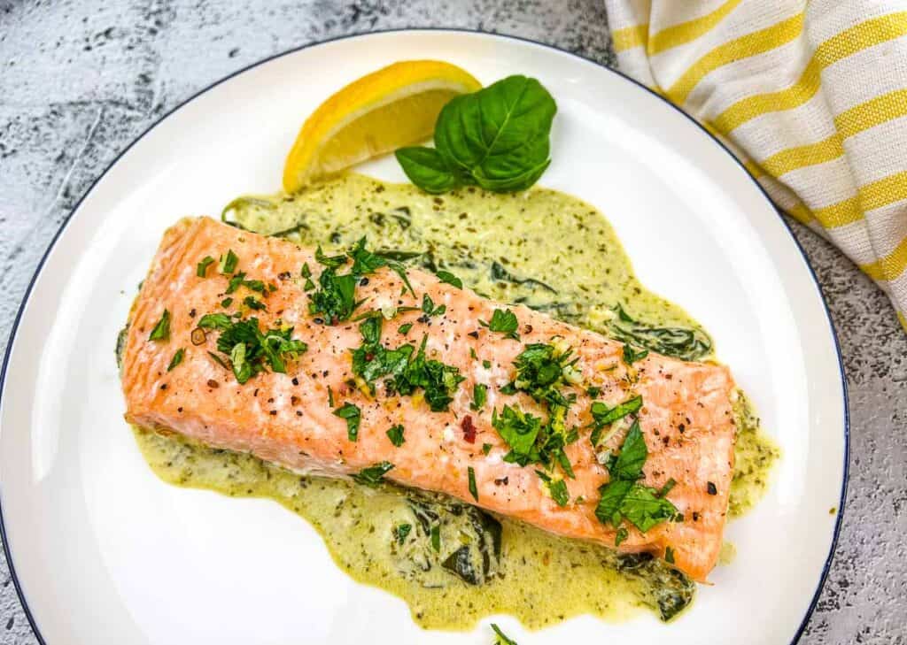 Baked Pesto Salmon on a plate.