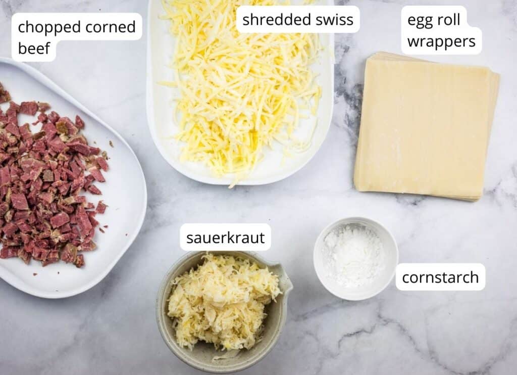 Labeled ingredients to make Reuben Egg Rolls.