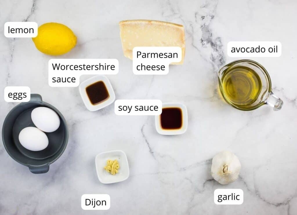 Labeled ingredients to make Caesar Salad dressing.