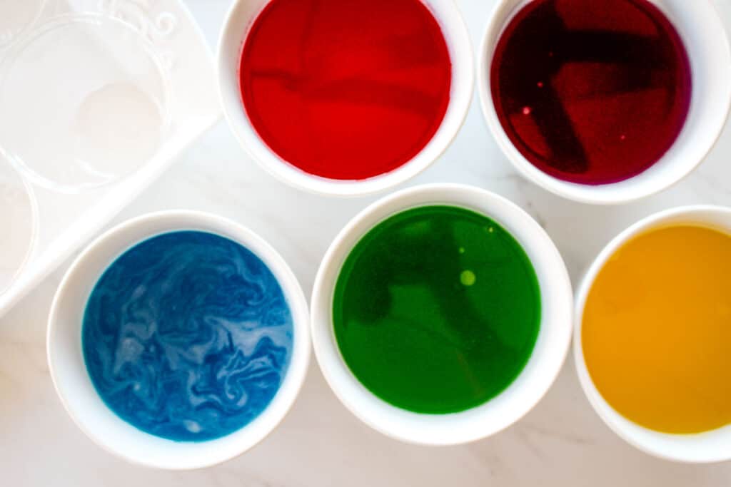 Cooling gelatin ready to be added to the cups.
