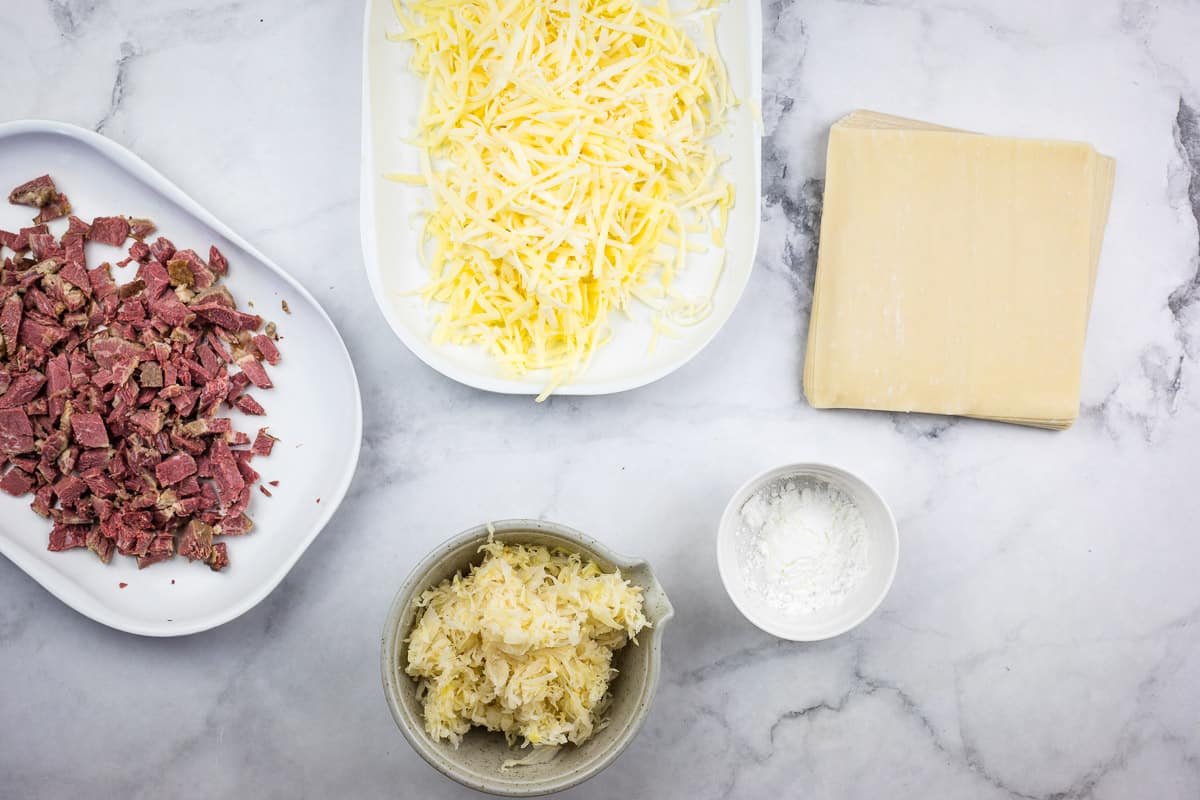 Ingredients to make Reuben Egg Rolls.