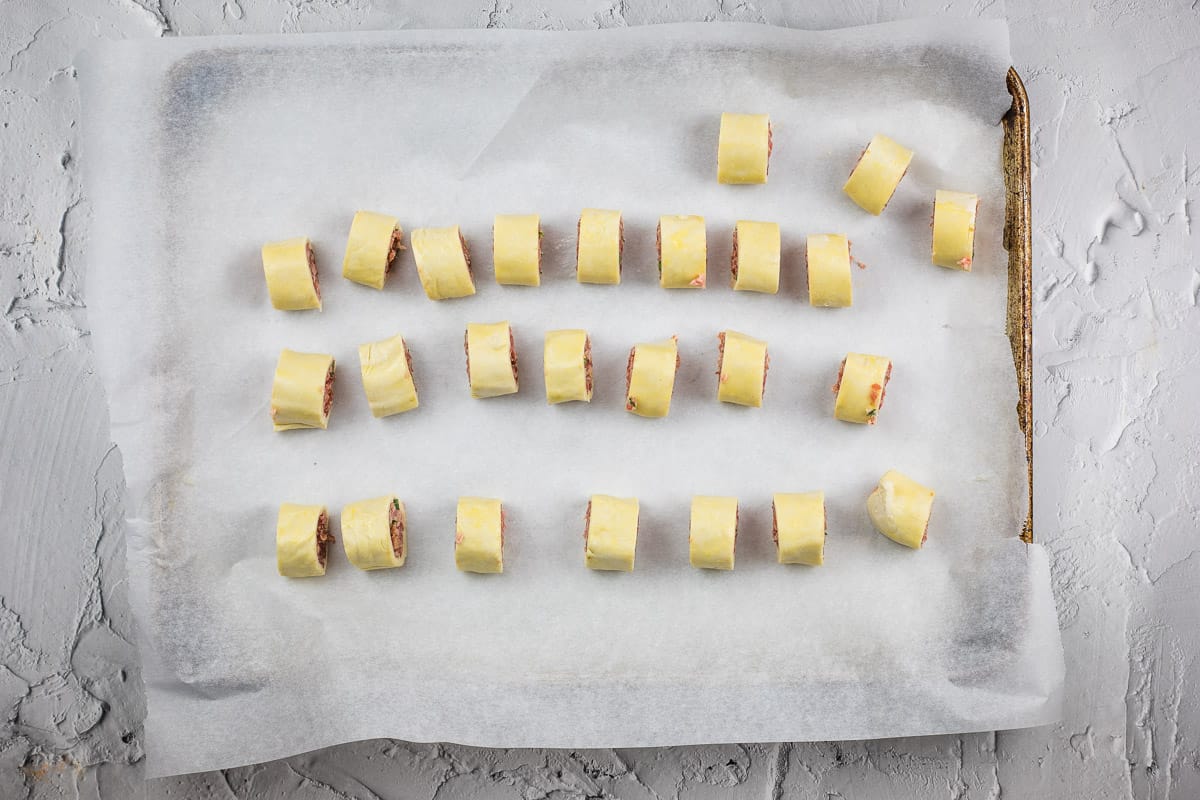 Sausage rolls cut into bites.