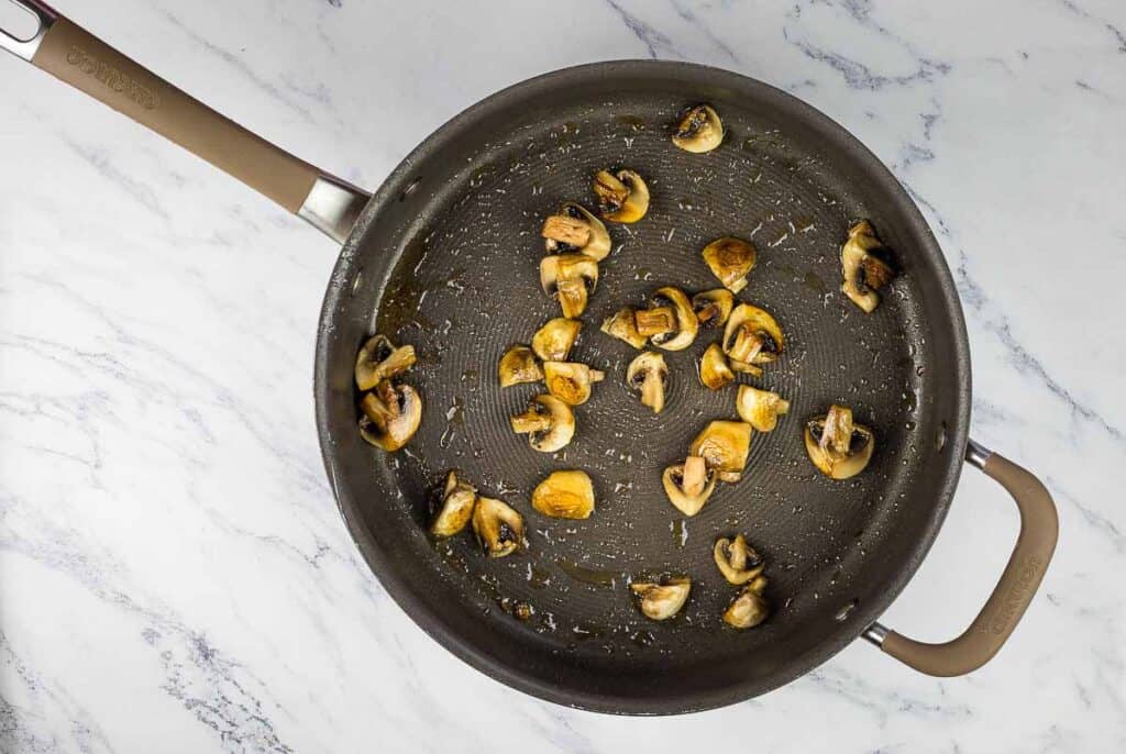 Saute the mushrooms in butter.