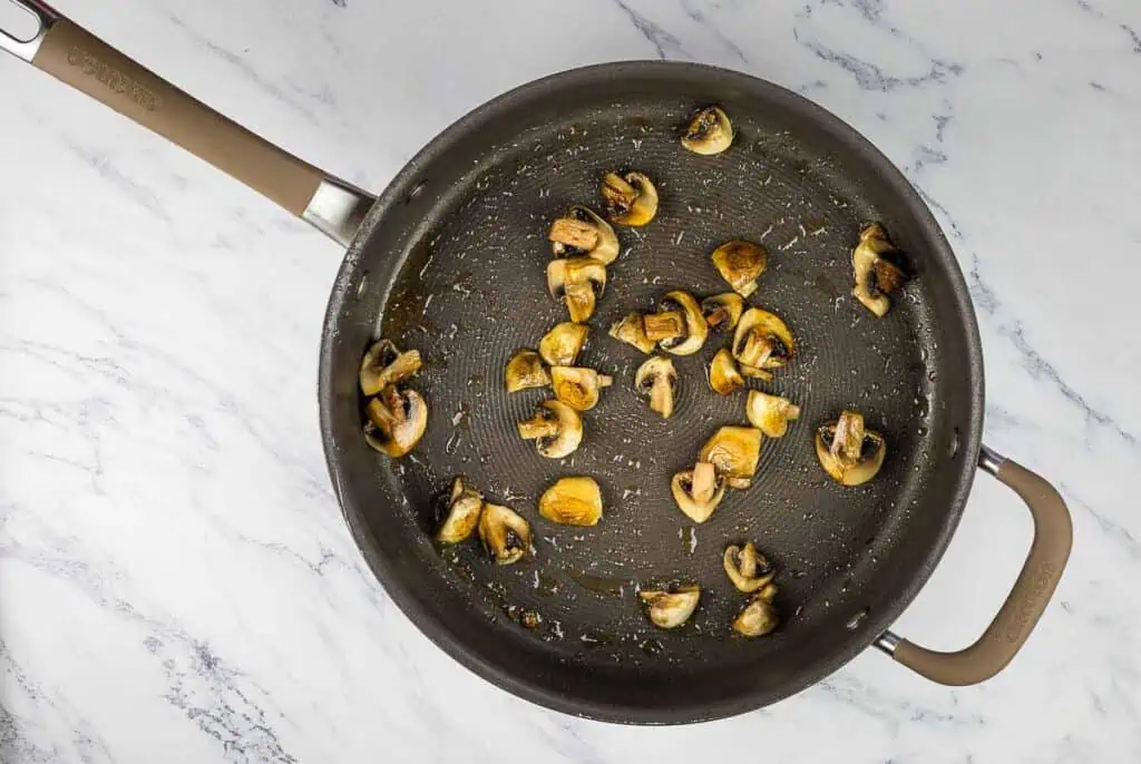 Saute the mushrooms in butter.