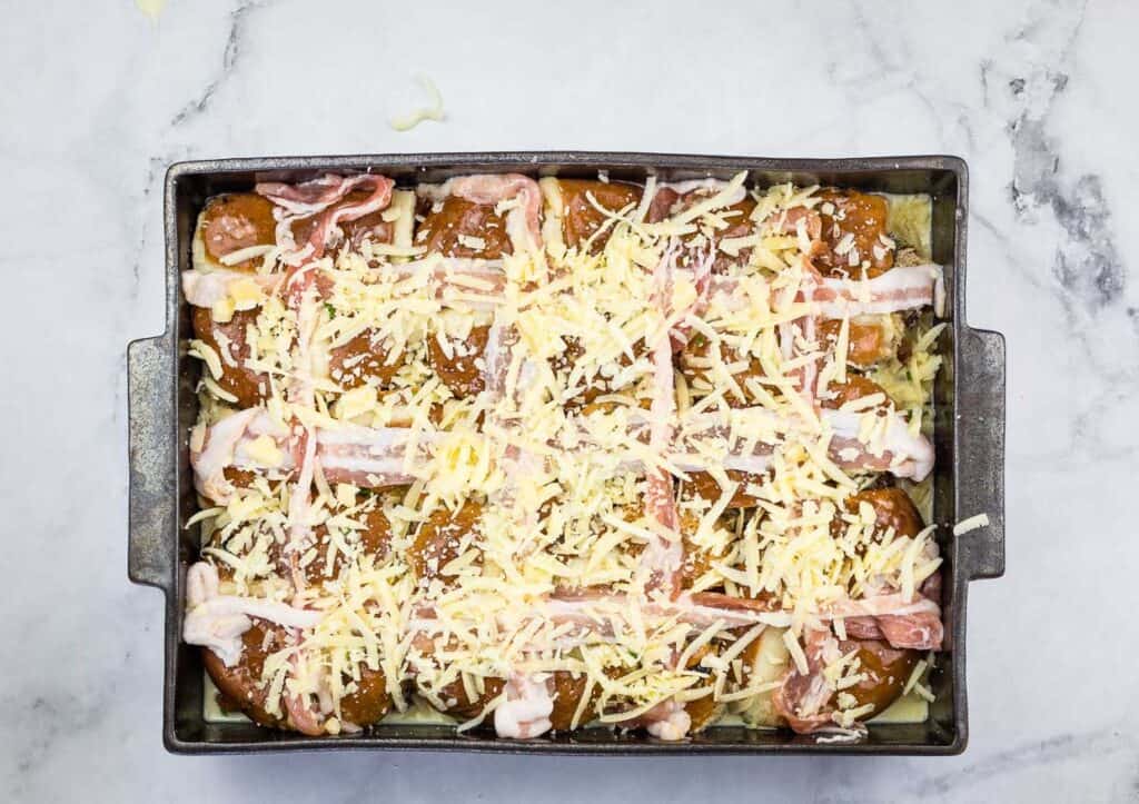Hot Cross Bun Breakfast Casserole ready for the oven.