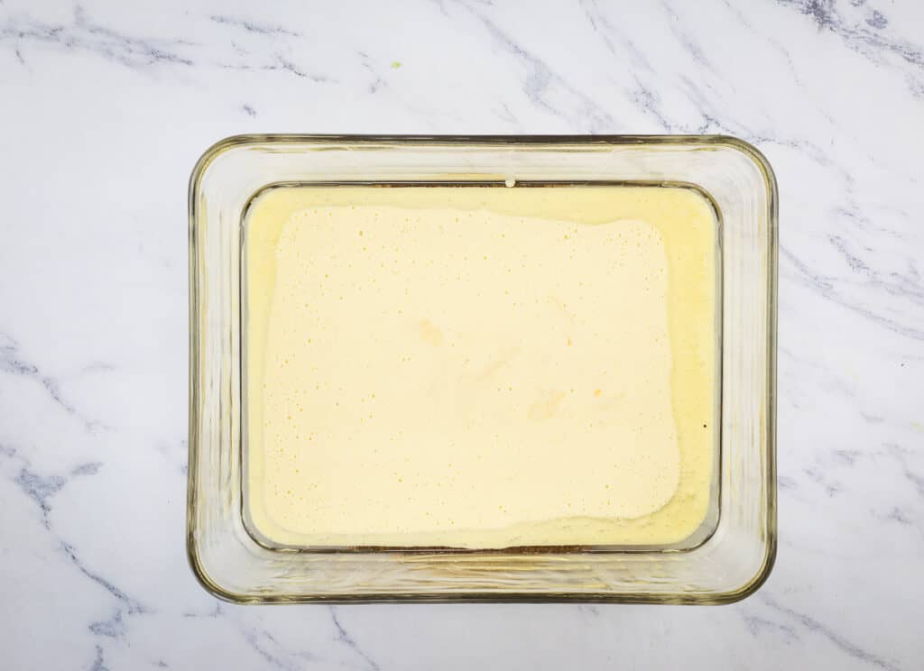 Batter in the hot oil in the baking dish.