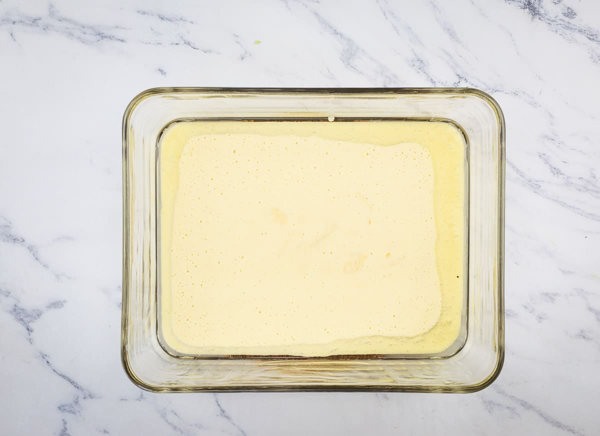 Batter in the hot oil in the baking dish.