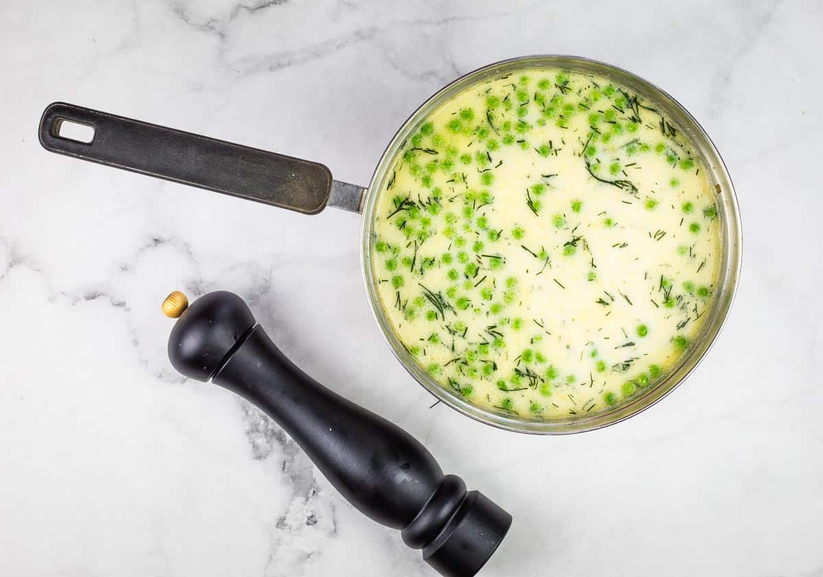 Cream and peas added to the soup.
