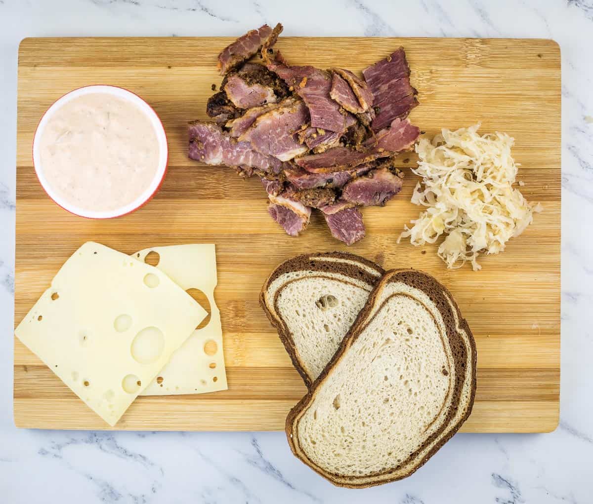 Ingredients to make Pastrami Reuben Sandwich.