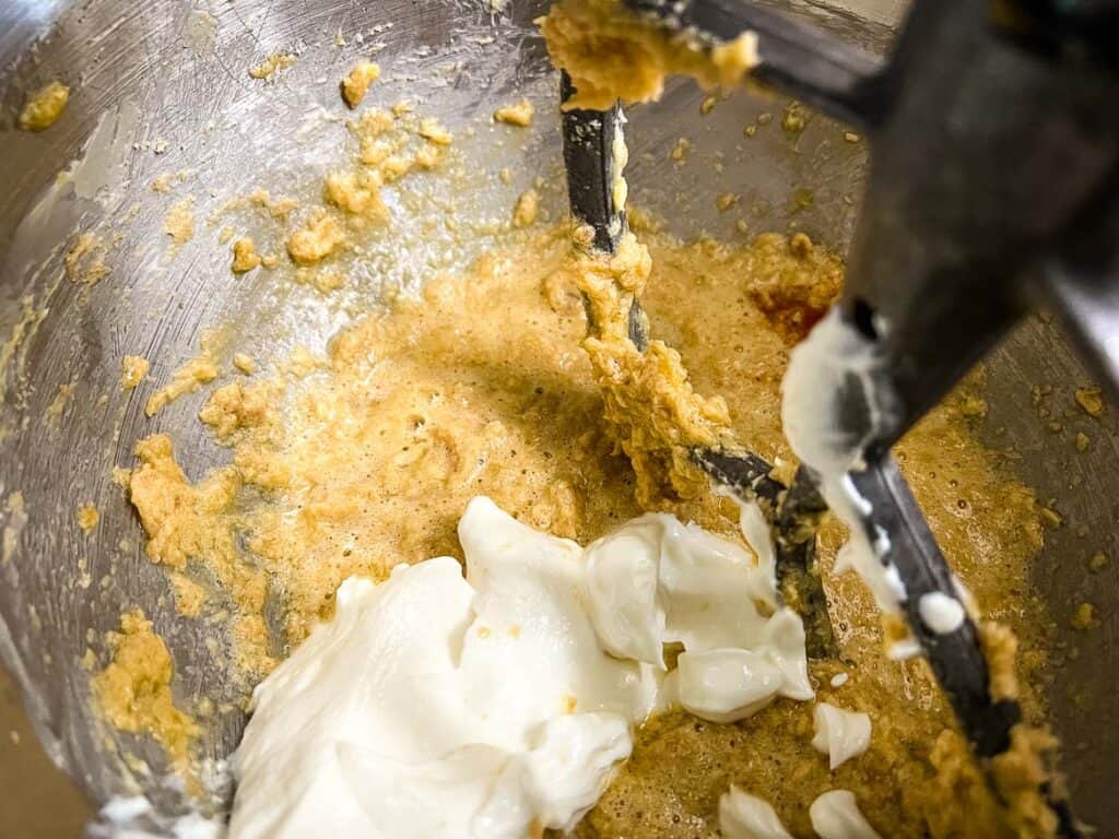 Eggs and yogurt added to stand mixer.