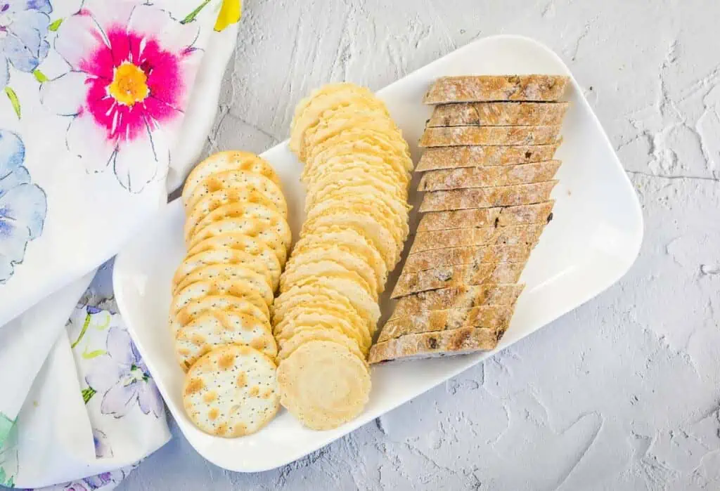 Breads and crackers on a plate for charcuterie.