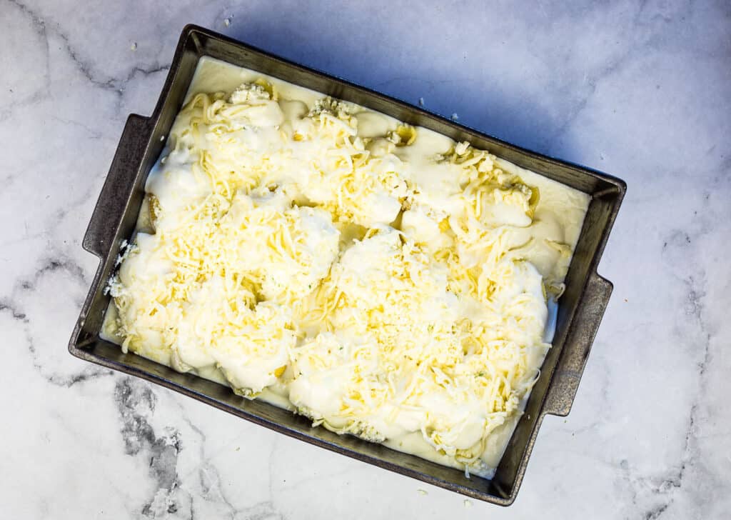 Top with cheese and bake.
