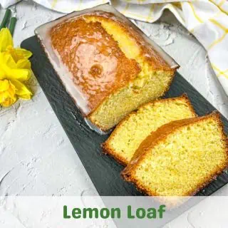 Lemon Loaf on a black platter.