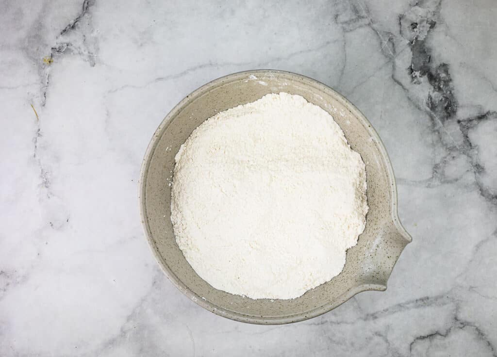 Dry ingredients mixed in a bowl.