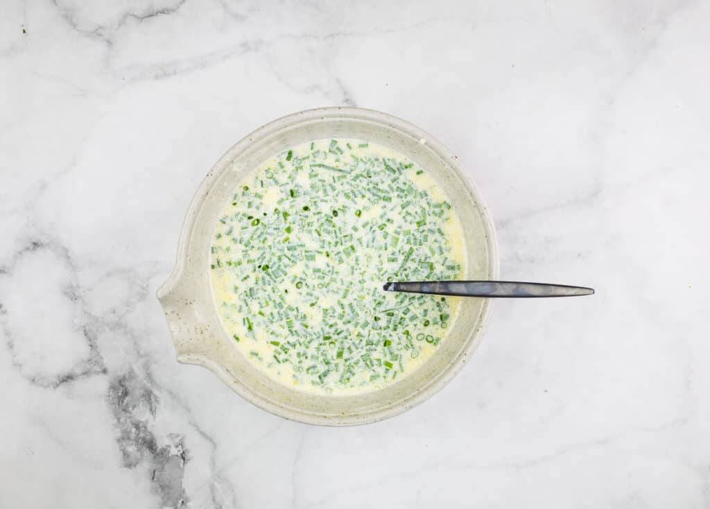 Mixed wet ingredients in a bowl.