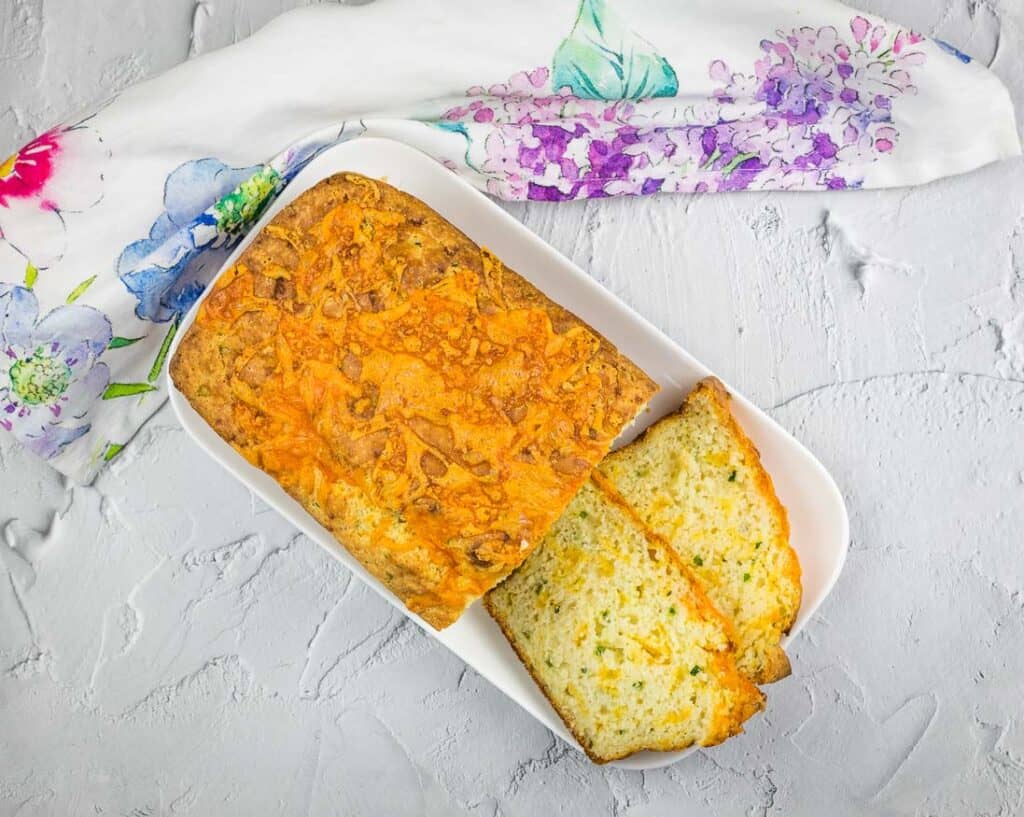Finished Potato Cheese Bread on a white platter.