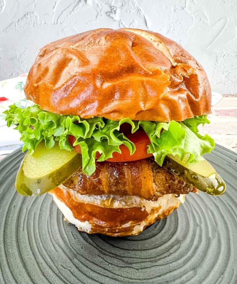 Bacon-Wrapped Burger on a pretzel bun.