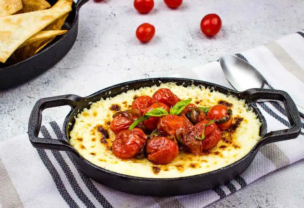 Baked Ricotta Dip in a black dish.
