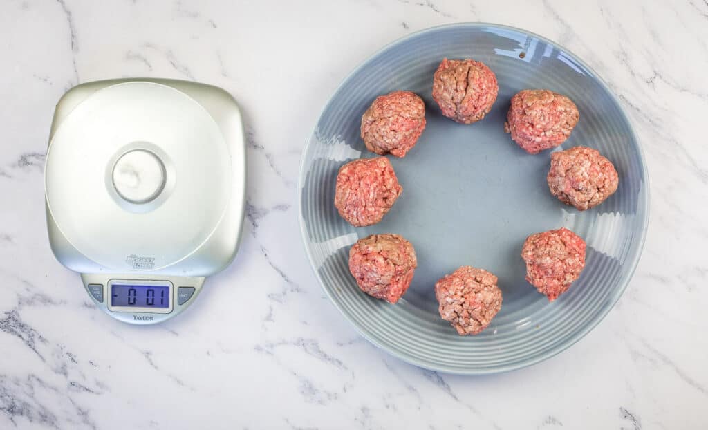 2 ounce meat balls on a plate.