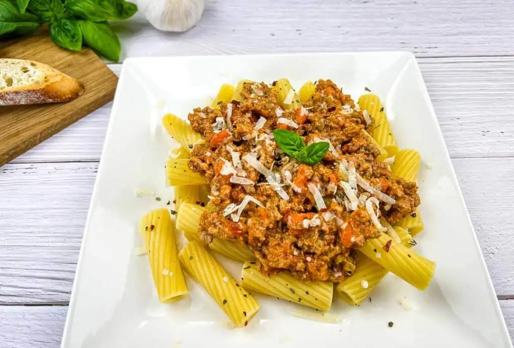 Authentic Bolognese Ragu on a white plate.