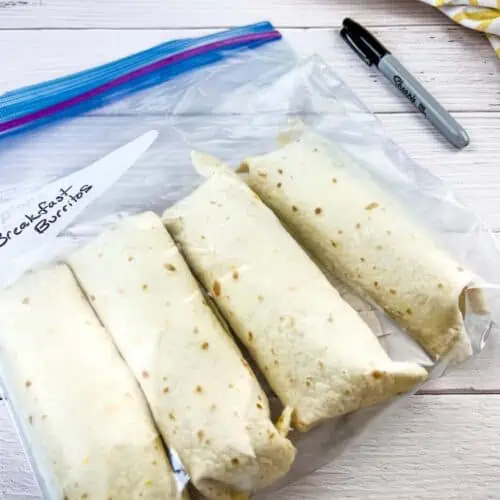 Breakfast burritos in a bag ready for freezing.