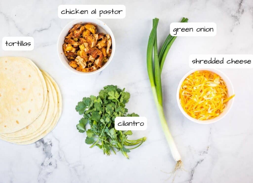 Labeled ingredients to make Chicken Al Pastor Quesadillas.