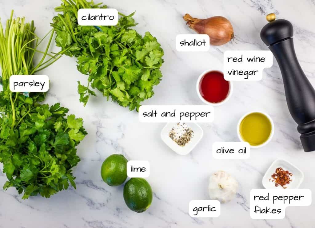 Labeled ingredients to make chimichurri.