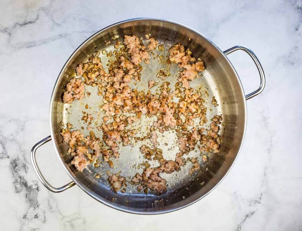 Browned pestata in a large pot.