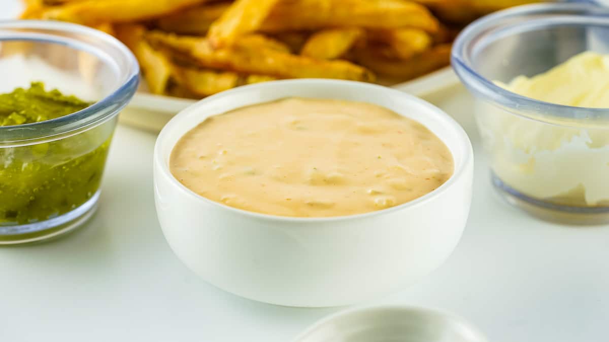Copycat Animal Sauce in a bowl with fries around it.