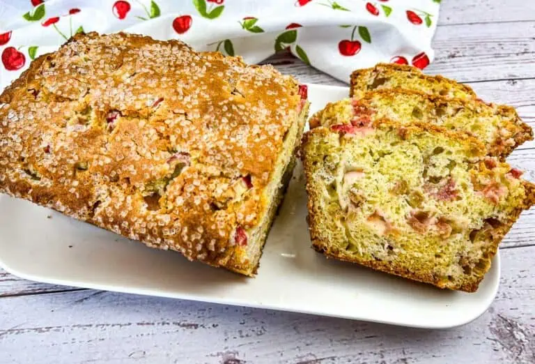 Sliced Rhubarb bread on a plate.