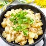 Gnocchi with Lemon Parmesan Sauce in a black serving dish.