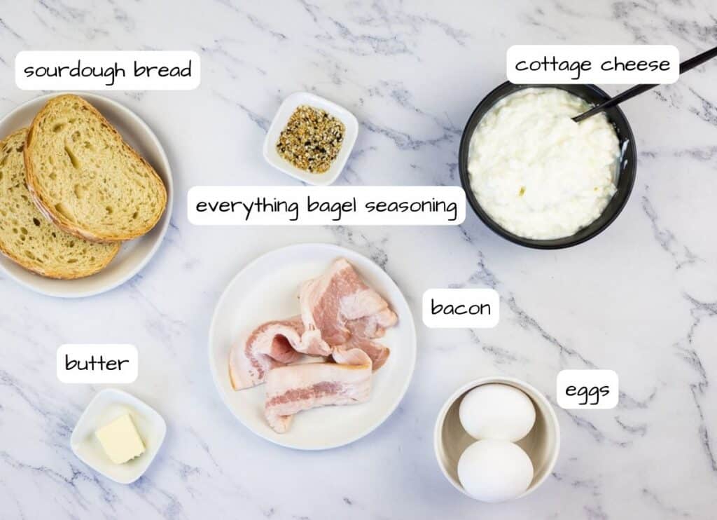 Labeled ingredients to make Cottage Cheese Toast with Sunny-Side Up Egg & Bacon.
