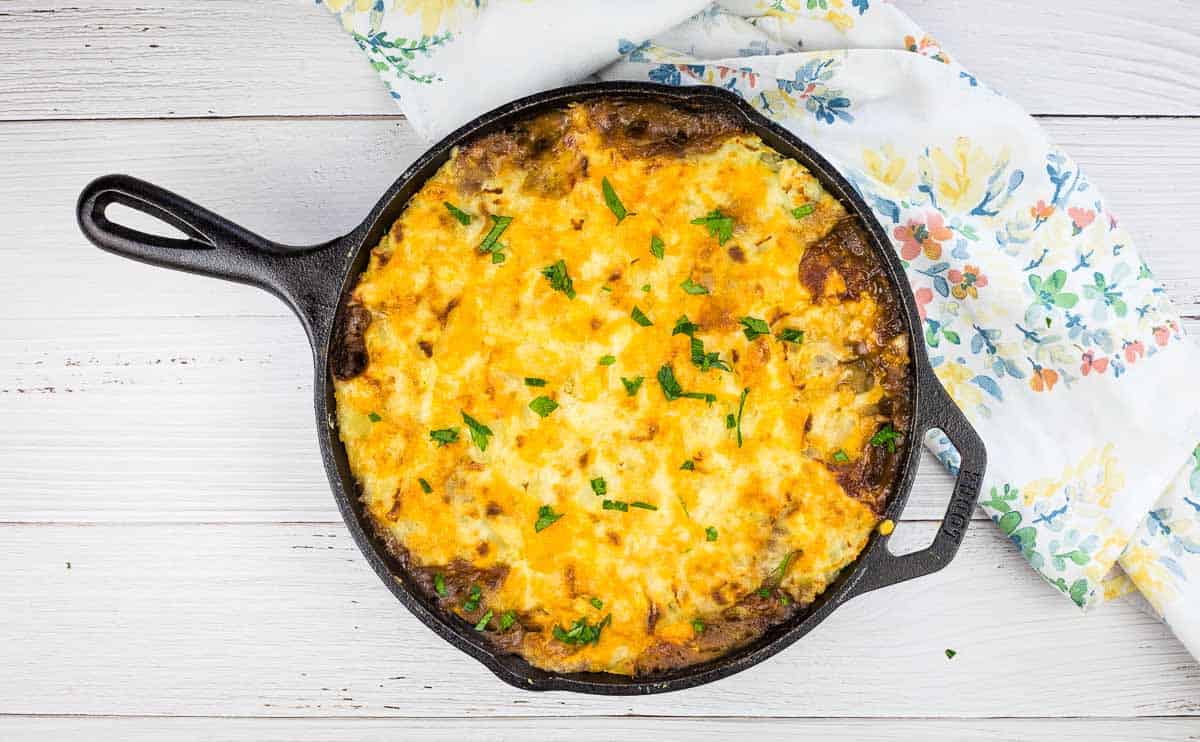 Leftover Roast Beef Shepherd's Pie in a cast iron dish.