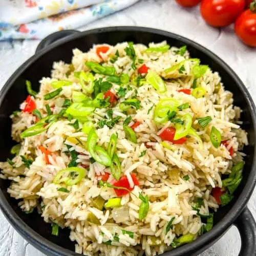 Mediterranean Rice in a black serving bowl.