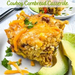 Cowboy Cornbread Casserole on a plate with avocado.