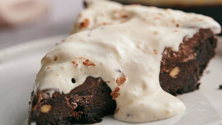 A slice of Mississippi Mud Pie on a plate ready to eat.