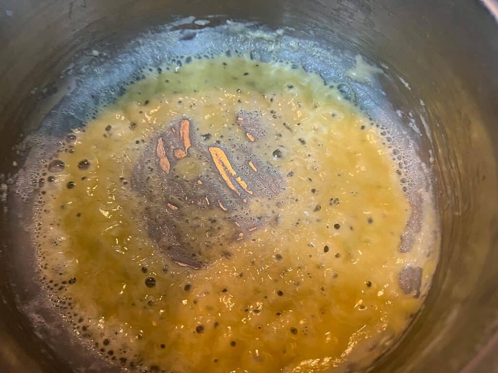 Flour and butter cooking in a pot.