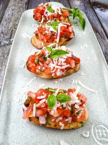 Tomato Bruschetta on a plate.