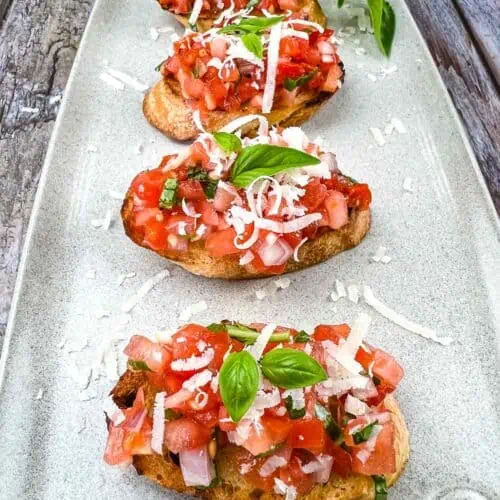 Tomato Bruschetta on a plate.