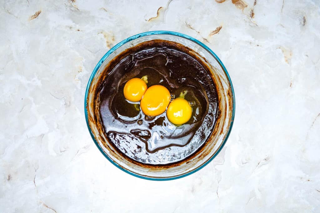 Eggs in the bowl with the brownie batter.