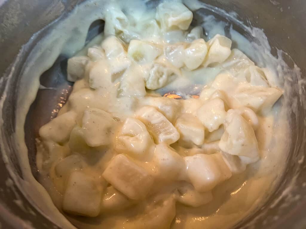 Cooked kohlrabi stirred into the cream sauce.
