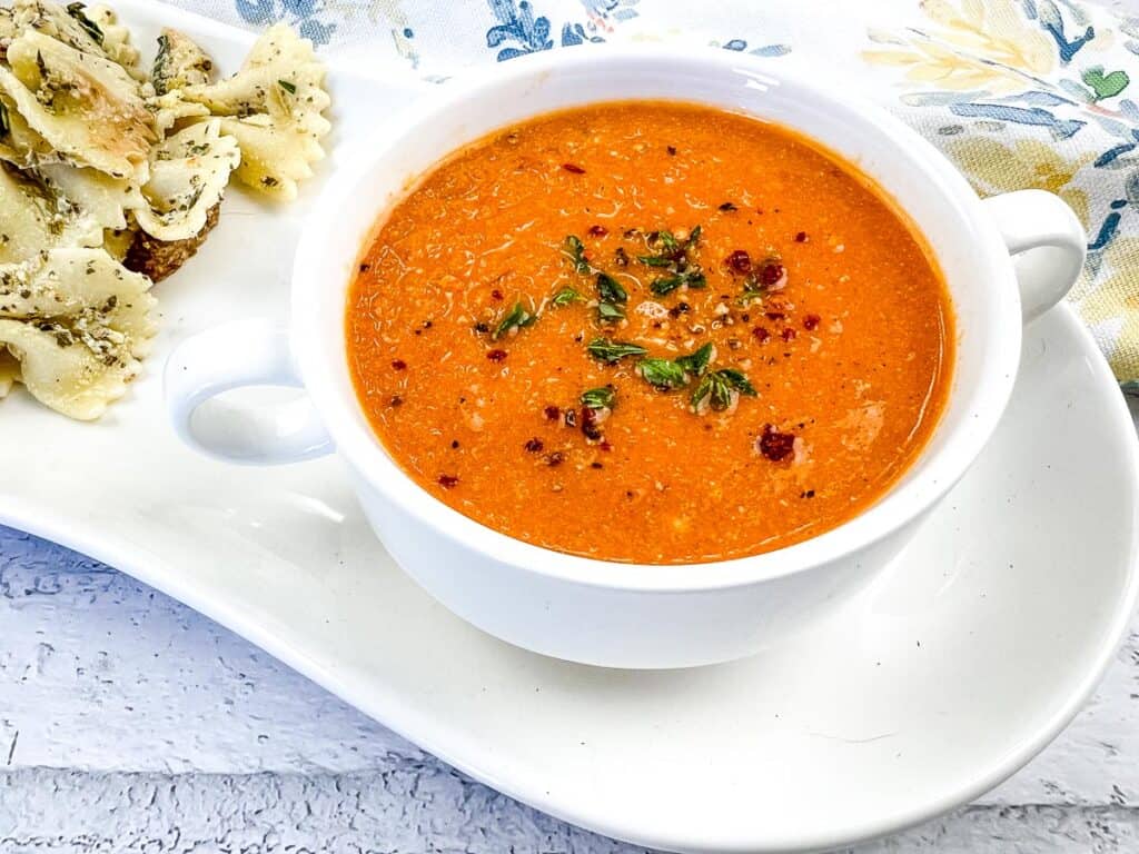 Smoked Tomato Soup in a white soup bowl.