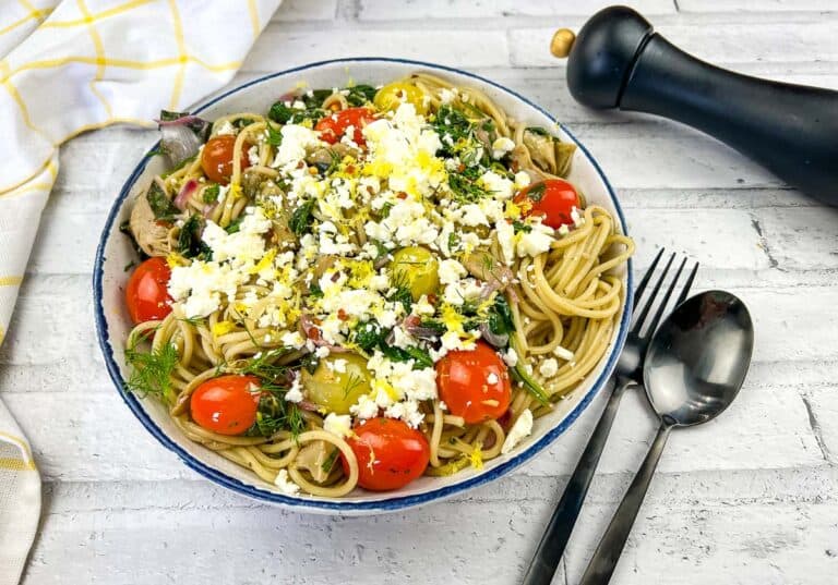 Greek spaghetti with tomatoes, feta, and kale.