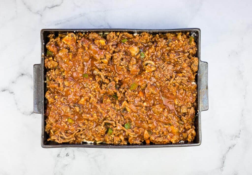 Noodles with the final meat layer.
