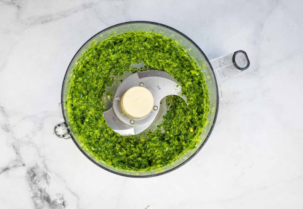Herb and chili puree in a food processor.
