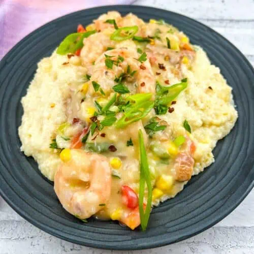 Shrimp and grits on a plate.