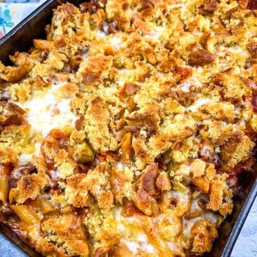 A casserole dish filled with pasta and cheese.