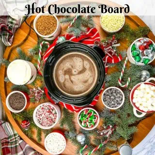 A hot chocolate board on a table.
