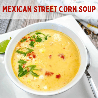 Mexican street corn soup in a white bowl.