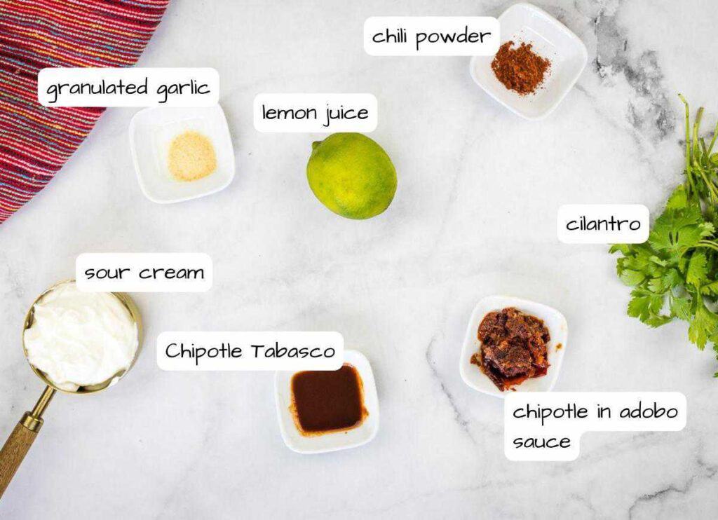 The ingredients for a mexican taco salad on a marble table.